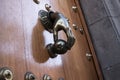 Hand knockers. Wooden door