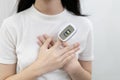 Hand of lady girl with fingertip pulse oximeter on finger for examination of the lung disease,checking for Coronavirus COVID-19