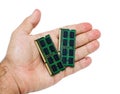 Hand with laptop memory modules Royalty Free Stock Photo