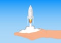 Hand launching rocket, business innovation startup concept