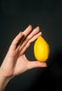 Hand with lemon Royalty Free Stock Photo