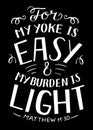 Hand lettering with Bible verse For my yoke is easy and my burden is light on black background.