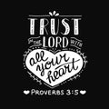 Hand lettering with bible verse Trust in the Lord with your heart on black background. Proverbs