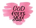 Hand lettering God loves you on watercolor pink heart Royalty Free Stock Photo