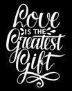 Hand lettering Love is the greatest gift on black background. Royalty Free Stock Photo