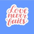 Hand lettering Love never fails, made on blue background. Royalty Free Stock Photo