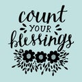 Hand lettering with motivational quote Count your blessing near flowers and leaves. Royalty Free Stock Photo