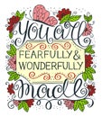 Hand lettering with motivational quote You are fearfully and wonderfully made near color flowers, leaves and butterfly . Royalty Free Stock Photo