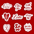 Hand lettering red patches and stickers - creative set incuding inscriptions: Love, love you, kiss me, all you need is love, with