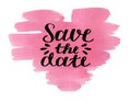 Hand lettering Save the date on watercolor pink heart.