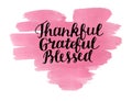 Hand lettering Thankful, grateful, blessed on watercolor heart. Royalty Free Stock Photo