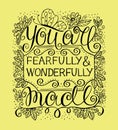 Hand lettering You are fearfully and wonderfully made near flowers and butterfly