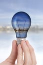 Hand with light bulb Royalty Free Stock Photo