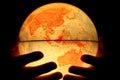 Hand on light globe Royalty Free Stock Photo