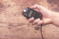 Hand with light meter Royalty Free Stock Photo