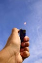 Hand, Lighter and Sky Royalty Free Stock Photo