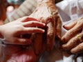 Hand of a little baby girl on hands of her grandmother`s and mother`s - family bond Royalty Free Stock Photo