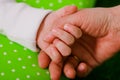 Hand of a little baby in mother's Royalty Free Stock Photo