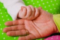 Hand of a little baby in mother's Royalty Free Stock Photo