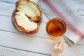 The hand of a little boy who is holding a mug of tea. Royalty Free Stock Photo