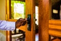 Hand Locking Metalic Lock On A Wooden Door In Kenya East Africa