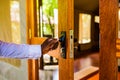 Hand Locking Metalic Lock On A Wooden Door In Kenya East Africa