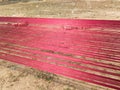 Hand loom silk threads spread out to dry in the sun on a bright, sunny day Royalty Free Stock Photo
