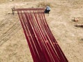 Hand loom silk threads spread out to dry in the sun on a bright, sunny day Royalty Free Stock Photo