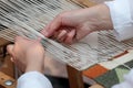 Hand loom weaver's hands Royalty Free Stock Photo