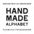 Hand made alphabet font. Distressed vintage letters and numbers on a grunge background.