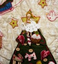 Hand made Angel on quilted Christmas tree.