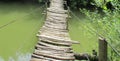 Hand made bridge over the river Smotrich, Kamenets Podolskiy, Ukraine Royalty Free Stock Photo