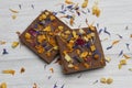 Hand made chocolate with freeze-dried mango and candied violet