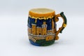 Hand made coffee mug with blue and orange painted details