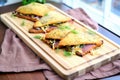 hand-made corned beef and cabbage pasties on a tray