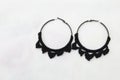 Hand made earing with black wool Royalty Free Stock Photo