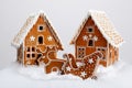 The hand-made eatable gingerbread houses, reindeer and cart Royalty Free Stock Photo