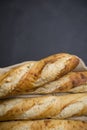 Hand made French bread selection on black background with copy area Royalty Free Stock Photo