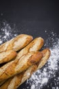 Hand made French bread selection on black background with copy area. Royalty Free Stock Photo