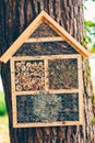 Hand made home for hibernating insects Royalty Free Stock Photo