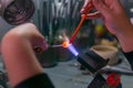 Hand-made lampworking in a glass-blowing workshop Royalty Free Stock Photo