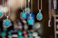 Hand made oval pendants with turquoise stone in a