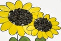 Hand-made picture of lovely sunflower. Painted with yellow and green gouache and glued black seeds. Art on the white background Royalty Free Stock Photo