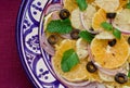 Hand made plate with citrus fruits salad