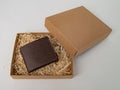 Brown real leather mens wallet in box Royalty Free Stock Photo