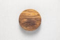 Hand-made round wooden pallets on light-colored linen. Wooden pallet texture background. Wooden plank natural texture background.