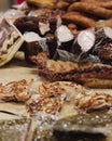 Hand made smoked meat products. Display meats, cold cuts and sausages at the street food fair. Soft focus blurred and noise effect