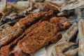 Hand made smoked meat products. Display meats, cold cuts and sausages at the street food fair. Soft focus blurred and noise effect