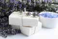Hand made soap bars with lavender flowers on  background Royalty Free Stock Photo