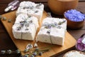 Hand made soap bars with lavender flowers on board Royalty Free Stock Photo